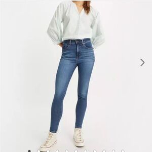 EUC high rise skinny jeans by Levi’s